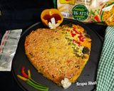 A picture of step 7 of Cheesy Maggi vegetable cake.