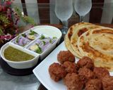A picture of step 7 of Gola kabab & lachcha Paratha with cold drink.