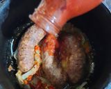 Foto del paso 4 de la receta: Chorizo con salsa en caldero