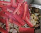 A picture of step 2 of Bread Upma with beetroot & sesame seeds.