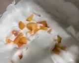 A picture of step 2 of Yogurt, Peach, and Amaretti Ice Cream Cake.