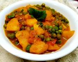 A picture of step 3 of Potato Peas Curry or Aloo Matar.