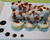 Foto del paso 9 de la receta Muslos de pollo con bechamel al orégano y tomates secos