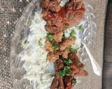 A picture of step 4 of Crispy fried chicken on creamy lettuce bed.