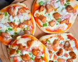 A picture of step 7 of Mini pizza(without cheese).