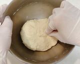 A picture of step 7 of 3-Minute Hand-Kneaded Honey Milk Pull-Apart Bread.