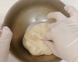 A picture of step 10 of 3-Minute Hand-Kneaded Honey Milk Pull-Apart Bread.