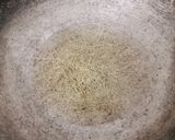 A picture of step 2 of Roti chivda (leftover chapati chura).