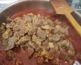 A picture of step 11 of Kerala style Beef fry with Malabar Paratha.