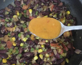 A picture of step 4 of Peri Peri Egg Beans Masala.