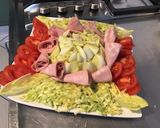 Une image de l'étape 9 de Salade d'endives tomates et courgette râpée à la mortadelle.