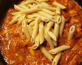 A picture of step 18 of Tuscan Chicken & Shrimp pasta.