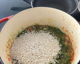 Foto del paso 6 de la receta: Arroz de calamar y guisantes