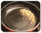 A picture of step 2 of Raw Mango Rice.