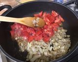 Une image de l'étape 11 de Dahl de lentilles jaunes aux carottes violettes, tomates et courgette.