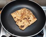A picture of step 9 of WALNUT APPLE PARATHA WITH CARAMEL SAUCE & VANILLA ICE-CREAM.