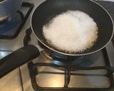 A picture of step 10 of Black berry Natural Ice-Cream with caramelized  Spun-Sugar.