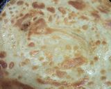 A picture of step 8 of Spicy lentils (kamande)in milk and cinnamon raisins chapati.