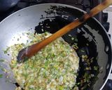 A picture of step 5 of Ugali served with fried French beans and steamed cabbage.