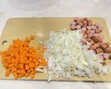 A picture of step 1 of Easy Sausage Omurice.