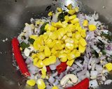 A picture of step 6 of Corn daliya upma.