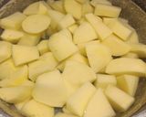 A picture of step 1 of Bangers, mash n onion gravy.