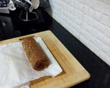 A picture of step 11 of Biscuits Meethi (Swiss roll style).