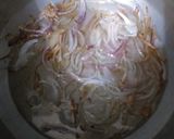 A picture of step 2 of Mazaydar or quick Aloo Matar chicken.