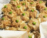 A picture of step 8 of Easy Pan-Steamed Shumai.