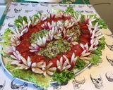 Une image de l'étape 10 de Salade de tomates,scarole,céleri et thon aux radis « fleurs ».