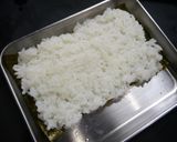 A picture of step 4 of Copycat Lawson Pork Tamago Onigiri.