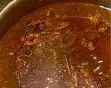 A picture of step 10 of Fesenjan (Persian Pomegranate Walnut Stew) with Chicken Thighs and Crispy Tahdig Rice.