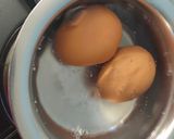 A picture of step 1 of Stuffed eggs.