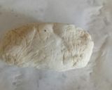 A picture of step 2 of Cacio and pepe breadsticks with prosciutto and goat's cheese.