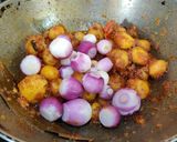 A picture of step 7 of ALOO DO PYAZA..