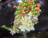 A picture of step 2 of Red Rice Kanda Batata Poha.