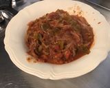 Une image de l'étape 12 de Oignons de roscoff aux tomates,poivron vert,épices et origan.