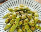 A picture of step 4 of Irresistible Garlic Butter Soy Sauce Grilled Edamame.