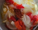 Foto del paso 2 de la receta Spaguetini con salsa de cebolla y pimiento rojo