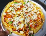A picture of step 1 of Egg pizza.