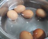 Foto del paso 1 de la receta Huevos rellenos gratinados
