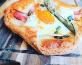 A picture of step 6 of Cheesey Bacon, Egg & Asparagus Wrap.