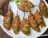 A picture of step 6 of Mirapakaya Bajji with Stuffed Murmura.