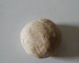 A picture of step 3 of Garlic tandoori roti on tava.