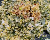 A picture of step 5 of Drumstick Saag with Moong dal and grated Coconut.