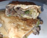 Foto del paso 6 de la receta: "Calzone" de huevo con ajos tiernos y setas