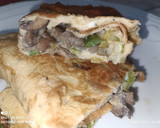 Foto del paso 6 de la receta: "Calzone" de huevo con ajos tiernos y setas