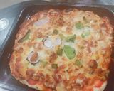 A picture of step 3 of Chicken tikka pizza.