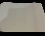 A picture of step 12 of Chocolate Strawberry Ice Cream Cake Roll.