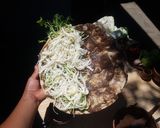 A picture of step 9 of Oaxacan Tlayudas.